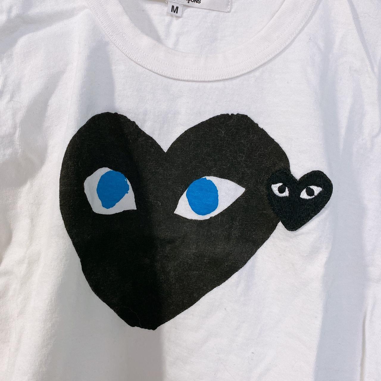 cdg black heart blue eyes