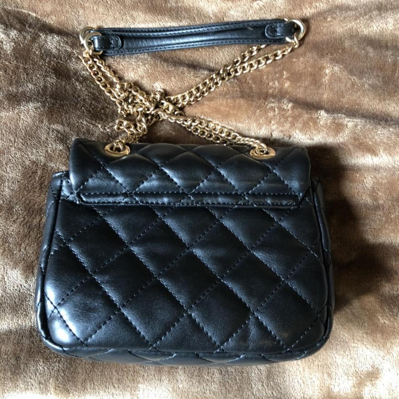 Black quilted Valentino bag with gold chain straps - Depop