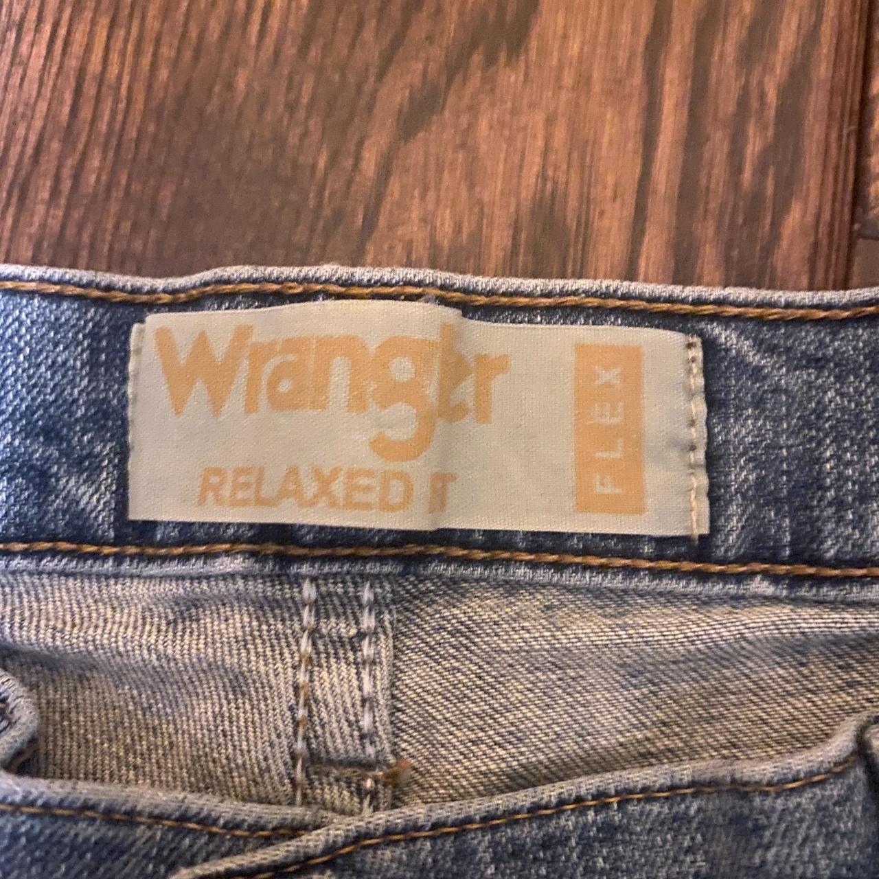 Distressed Relaxed fit wrangler jeans with a small... Depop