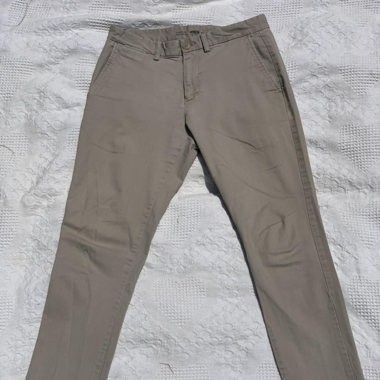 Old Navy slim fit khaki chino pants. Small tear... - Depop