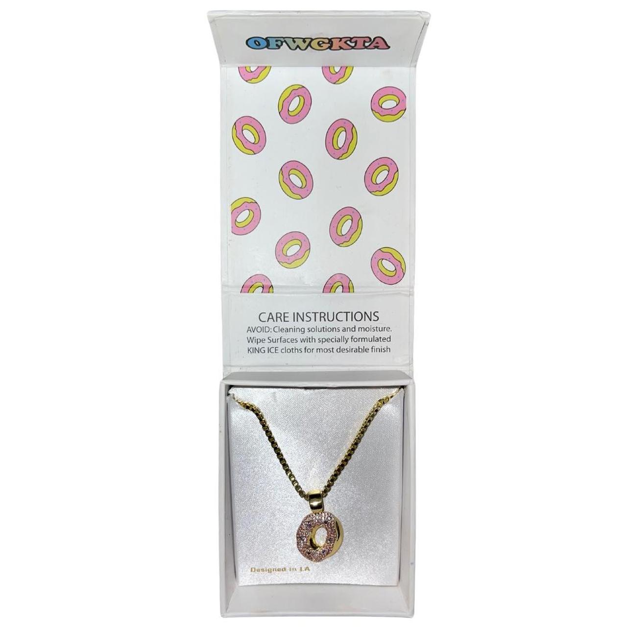 Our #kingice X #OddFuture Donut Necklace utilizes...