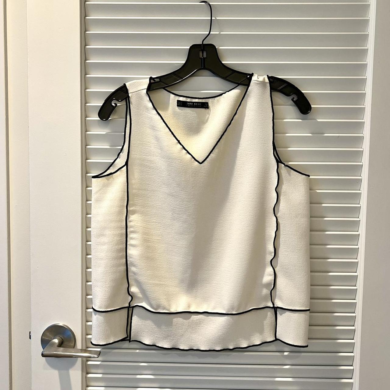 White Sleeveless Top Defect: tint on right side of... - Depop