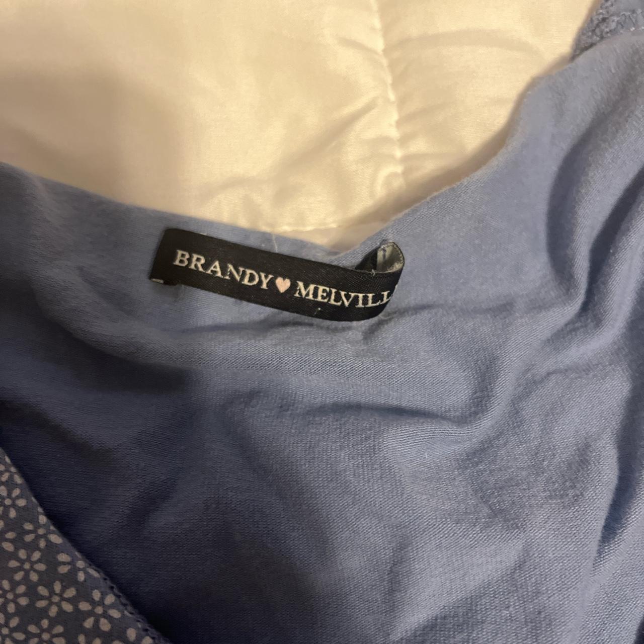 Brandy Melville Women's Blue and White T-shirt | Depop