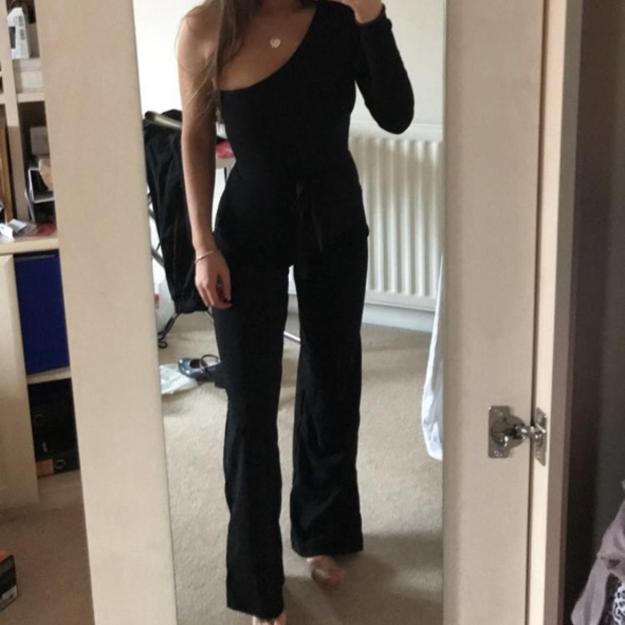 I saw it first black one shoulder jumpsuit Fits size... - Depop