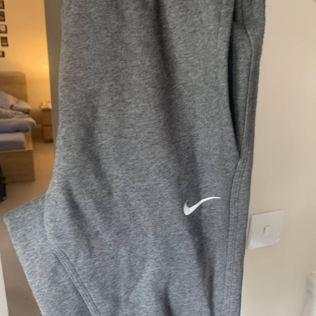 grey nike joggers blue tick