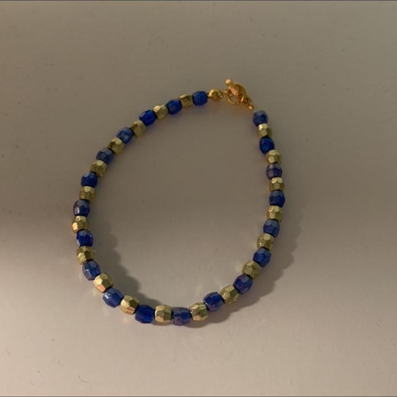 Handmade Gold and Navy blue bracelet with gold... - Depop