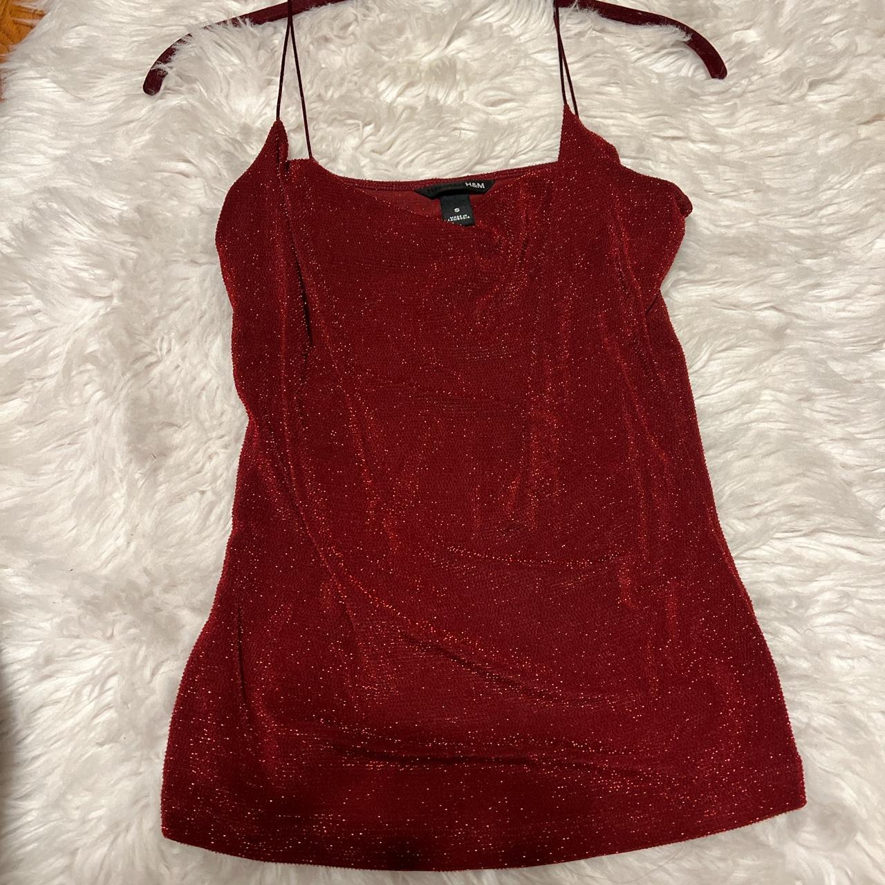 Shiny red top. Made in Cambodia. Size Small.... Depop