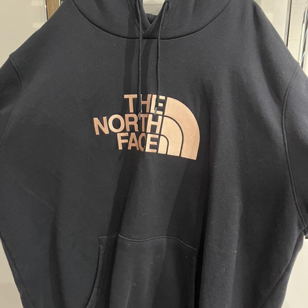 navy north face jumper