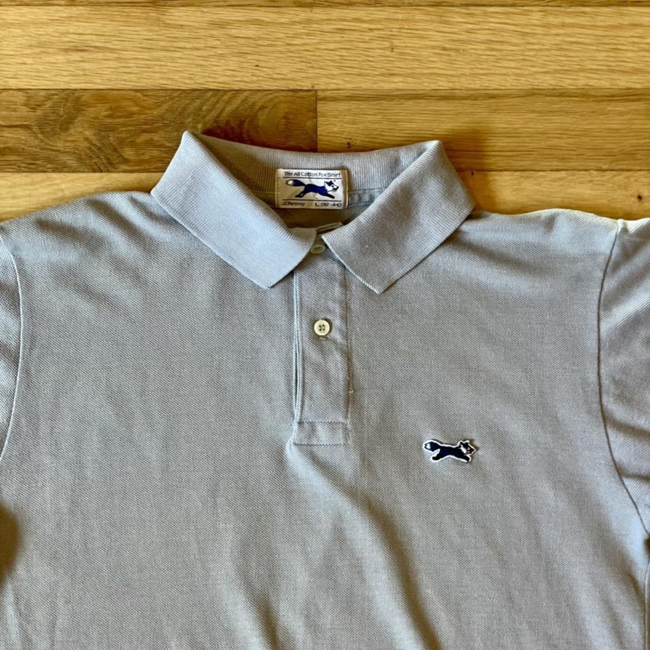 GREY JC PENNEY POLO SHIRT WITH THE BLUE EMBROIDERED... - Depop