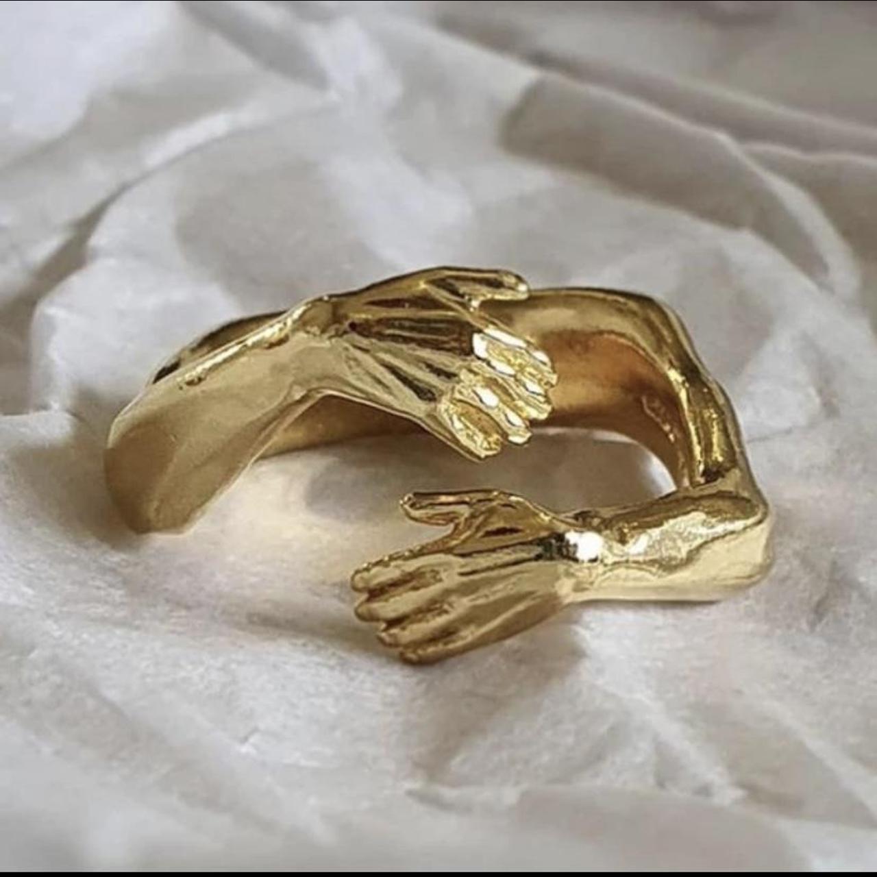 Gold hug online ring