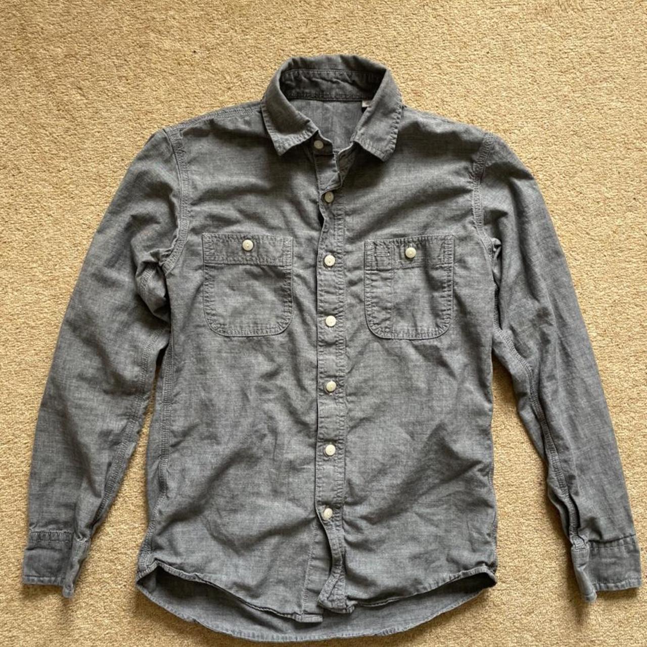 Uniqlo chambray button up work shirt in XS. Used,... - Depop