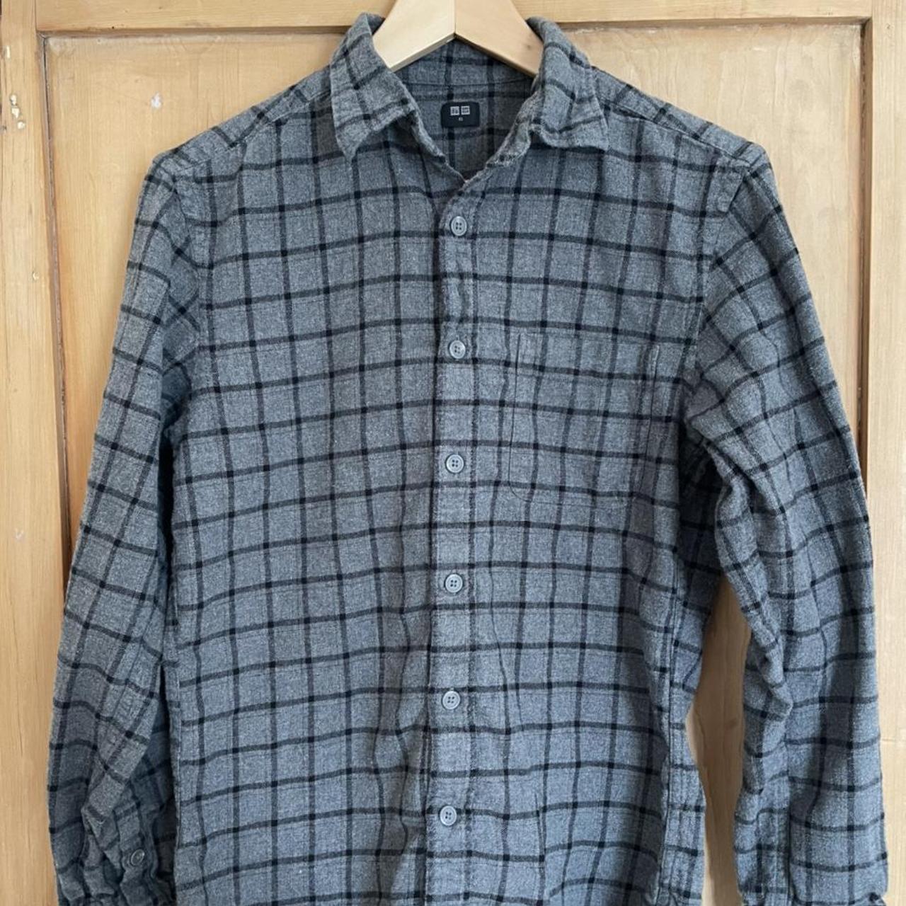 Uniqlo grey and black plaid/flannel shirt. Used, in... - Depop