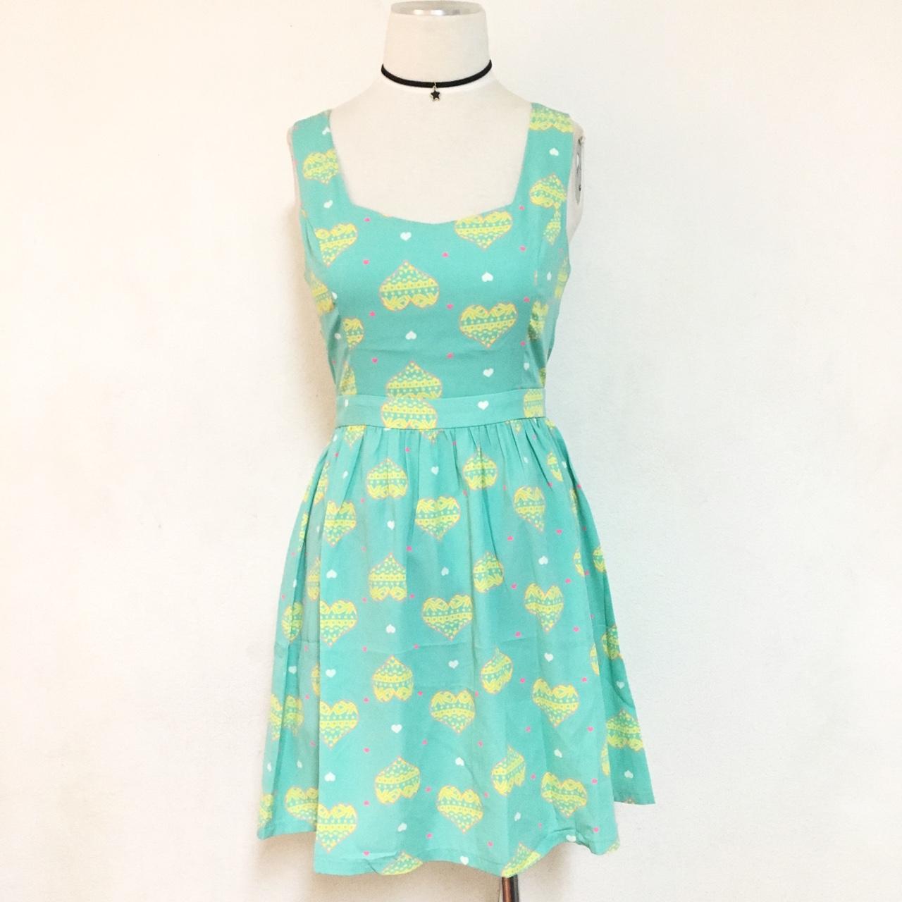 Mint heart shaped print back cutout flared dress .... - Depop