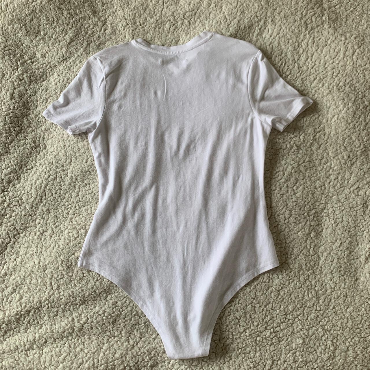 White baby tee style bodysuit Size 10 /... - Depop