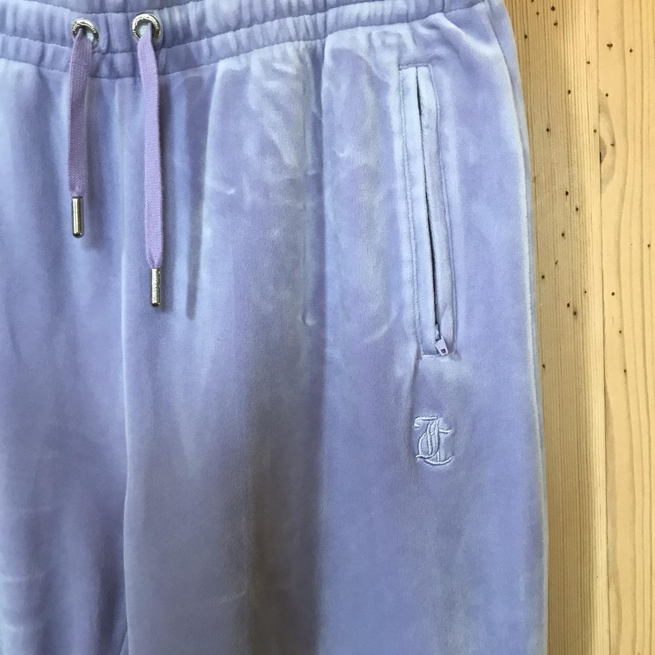 Lilac Juicy Couture flared leg trousers. Size M.... Depop