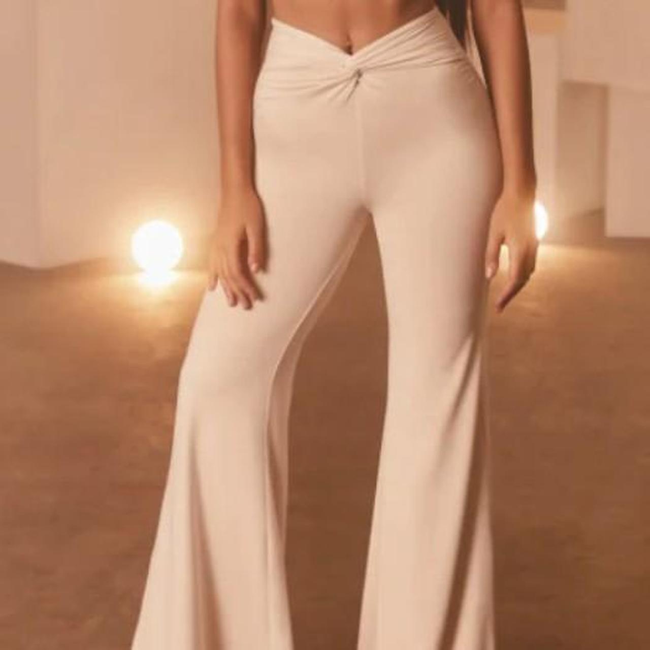 OH POLLY 'KNOTTY BUT NICE' KNOT FRONT FLARED TROUSERS IN CREAM