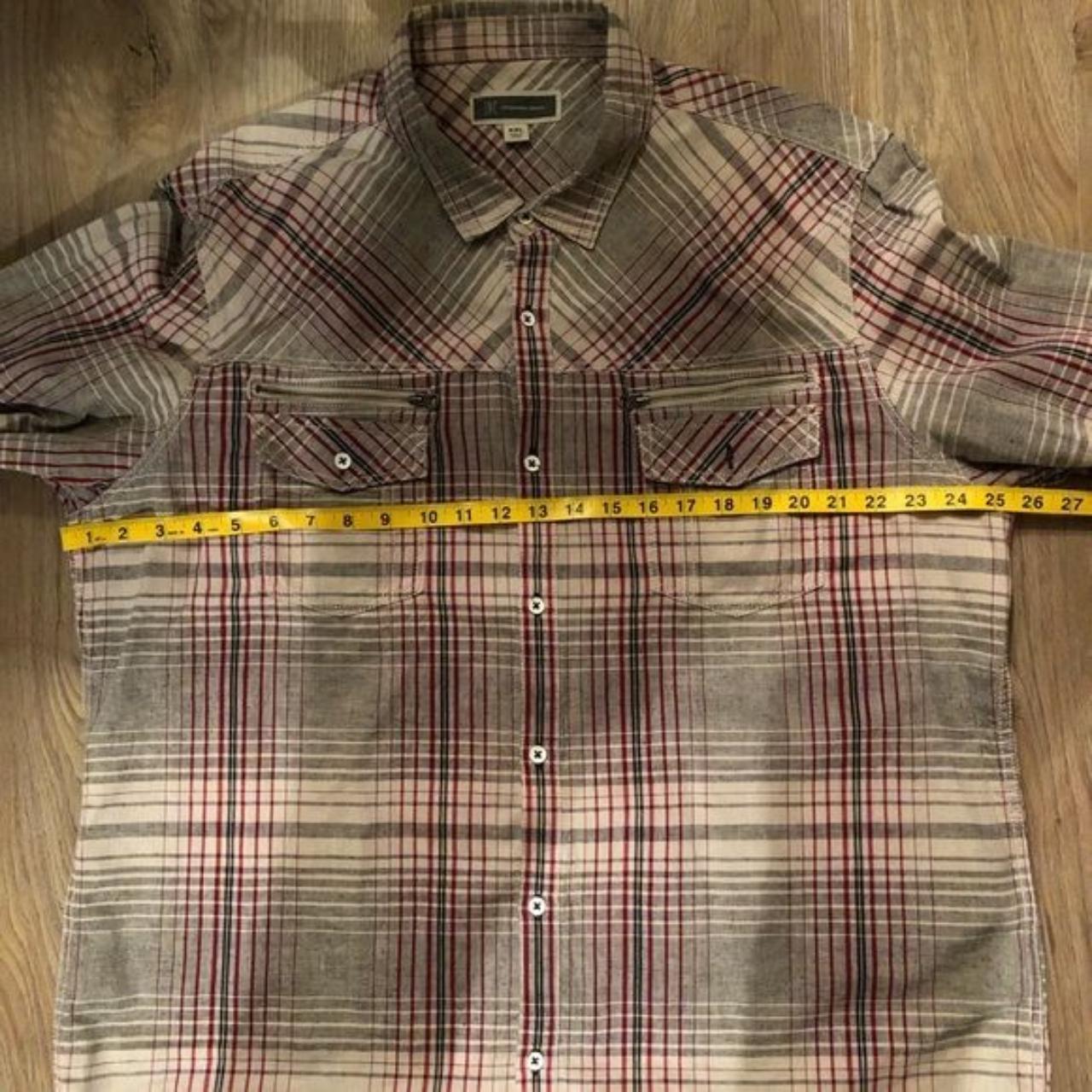 This button-down shirt from International Concepts... - Depop