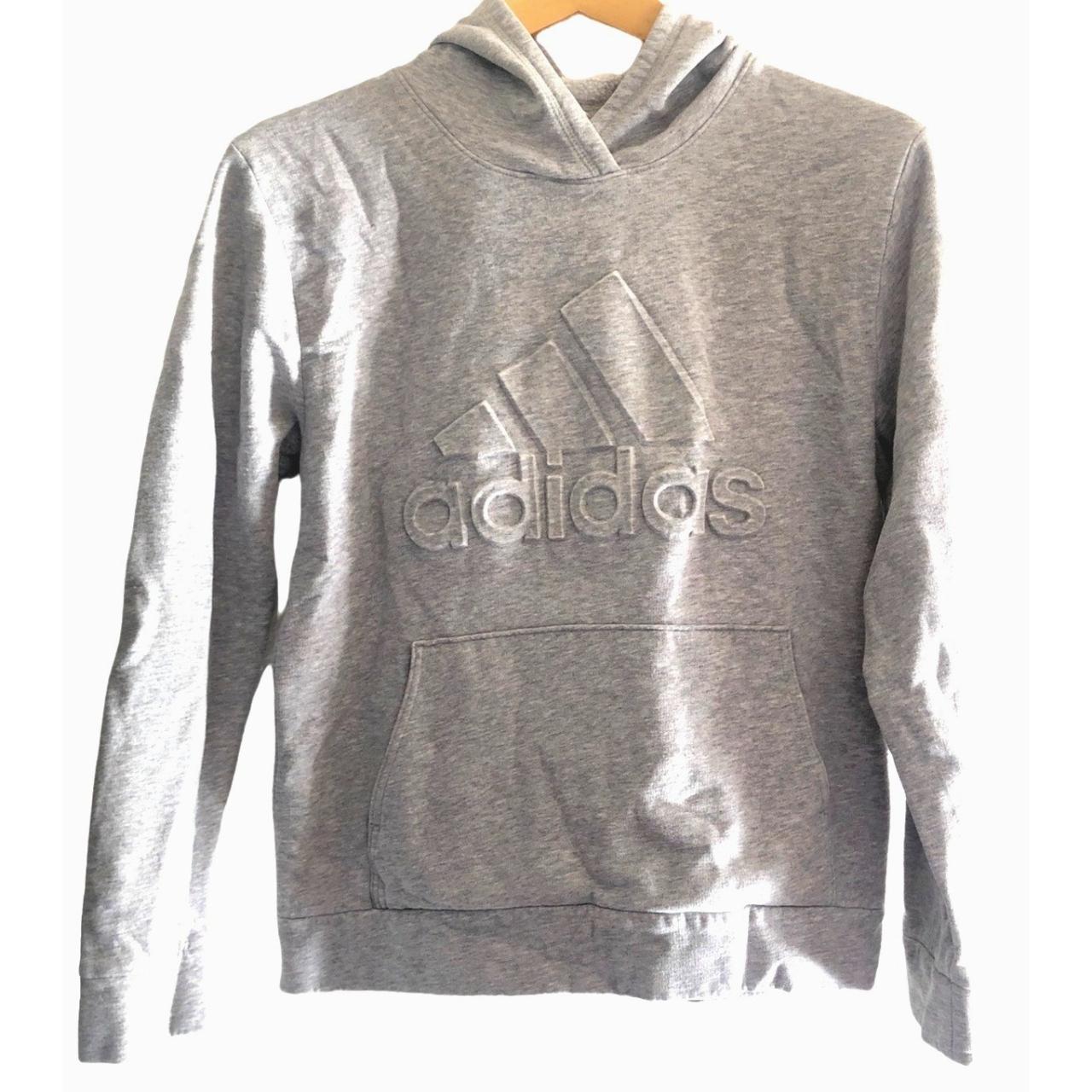 This warm and comfortable Grey Hoodie by Adidas is... - Depop