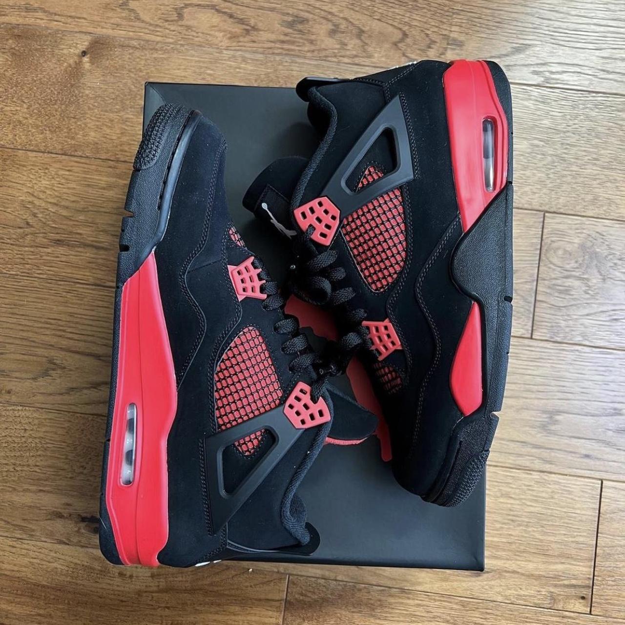 red and black jordans 4