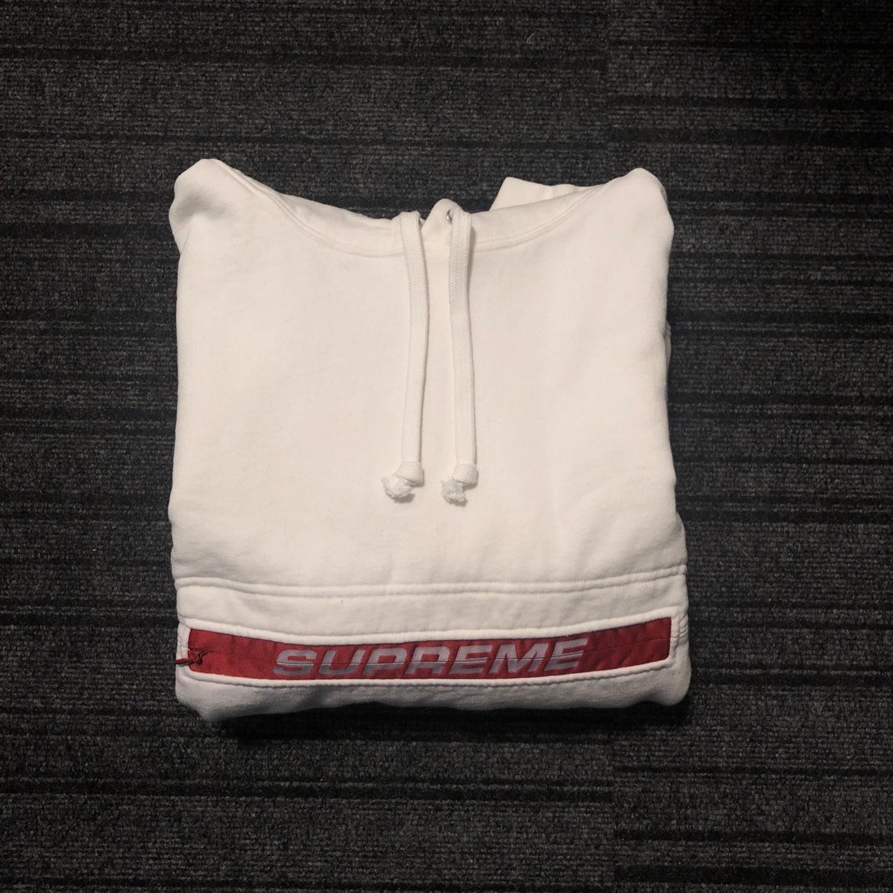 Supreme zip hot sale pouch hoodie