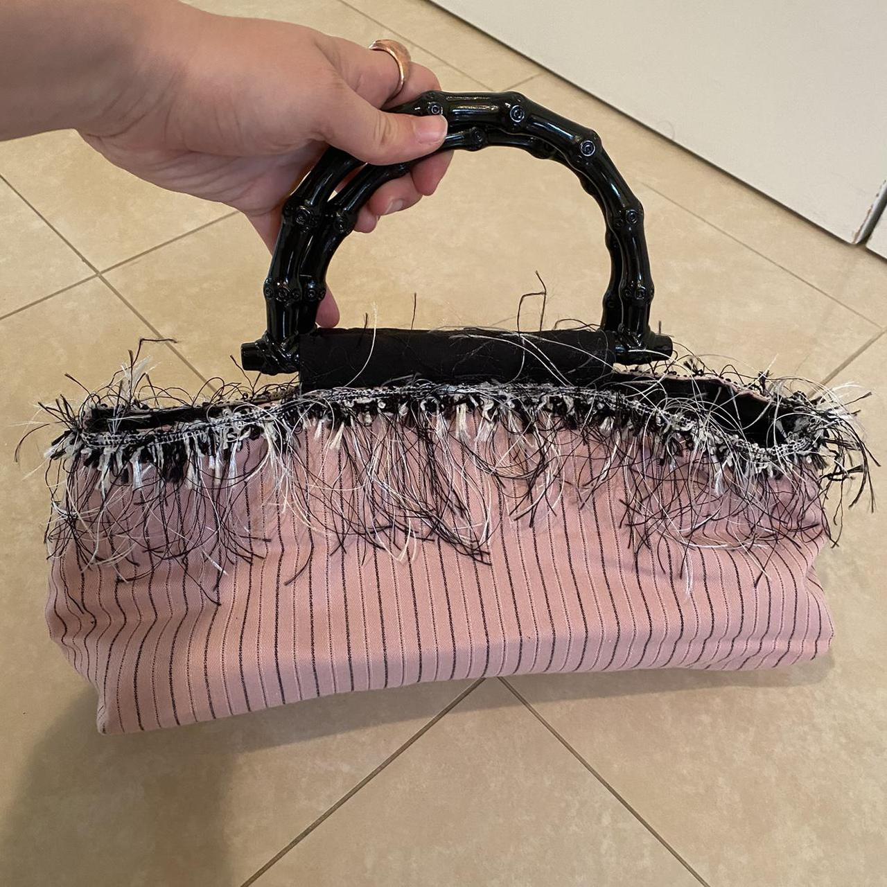 Pink purse with black and white stripes and black... - Depop