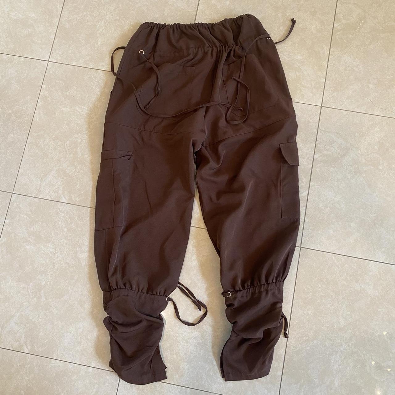 The most insane brown pants with tie detailing on... - Depop