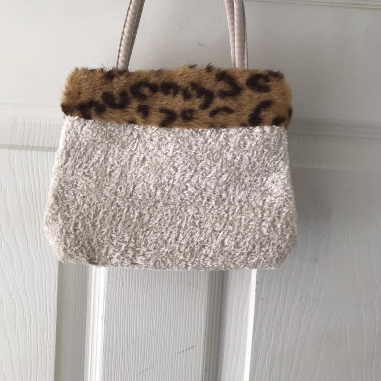 Fuzzy best sale cheetah purse