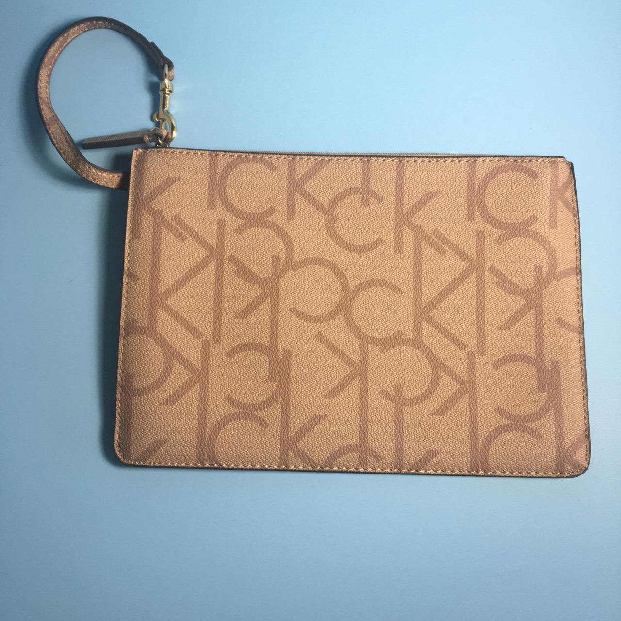 Calvin Klein Zip Monogram Wristlet Beige Pebbled... - Depop