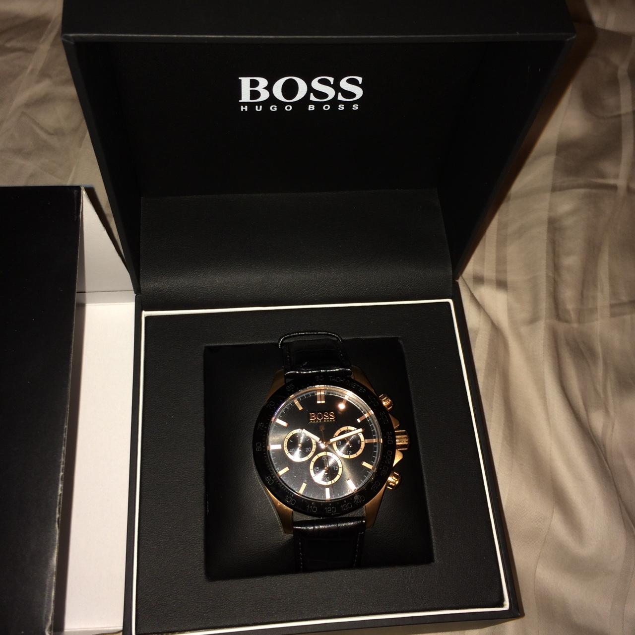 black and gold boss watch