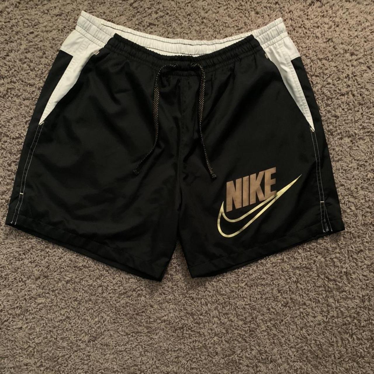 nike shorts black and gold