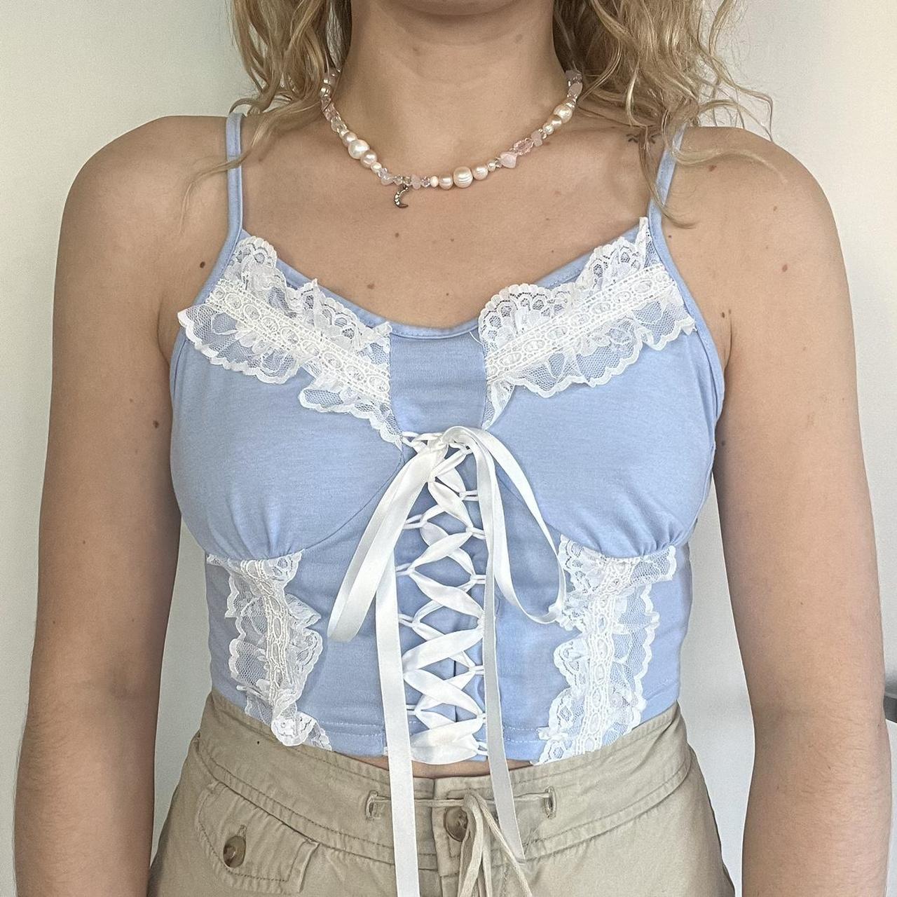 Free shipping on bundles!! Baby blue corset style... Depop