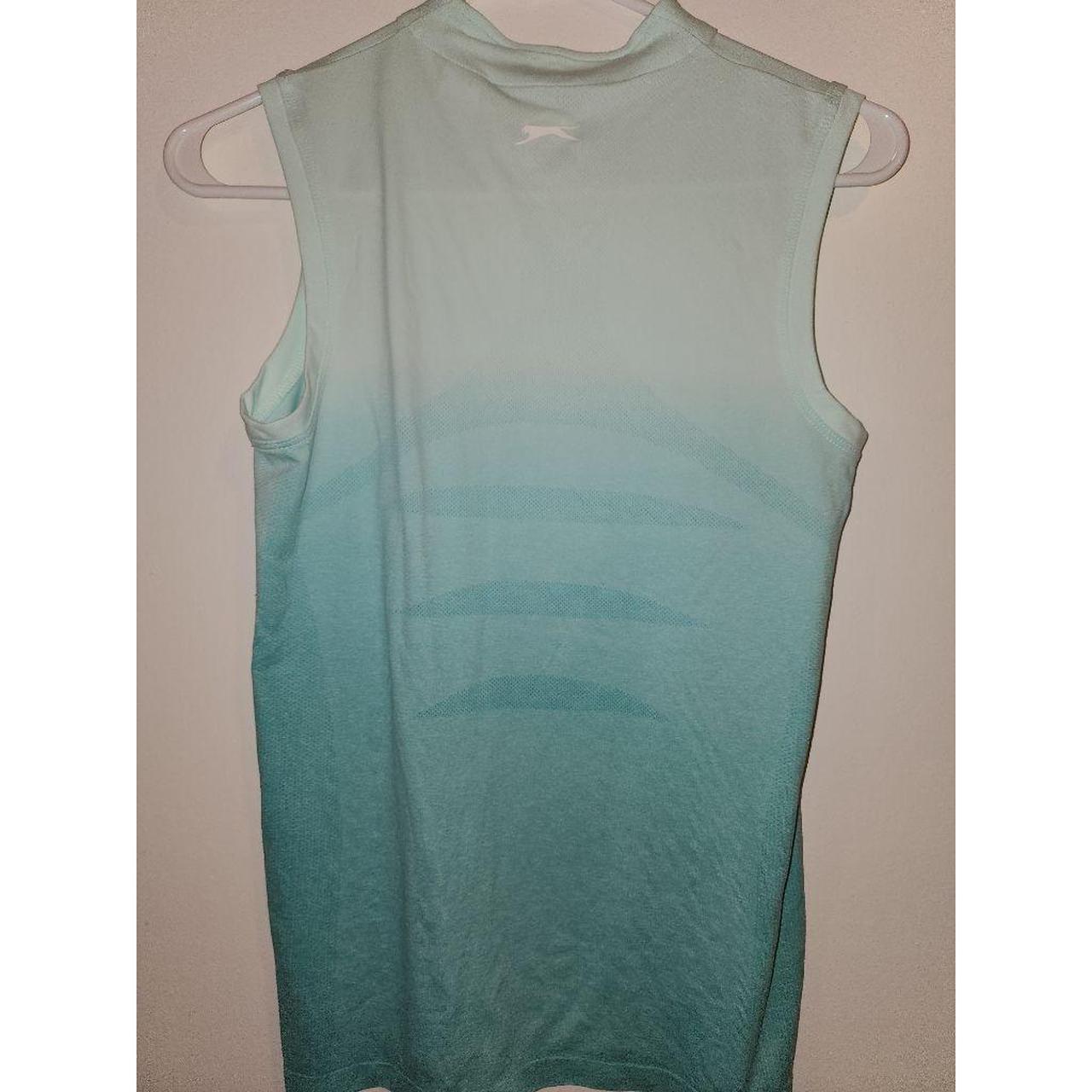 Product Image 4 - Small
Collar tank
Golf Tank
Ombre teal

65% Nylon
35%