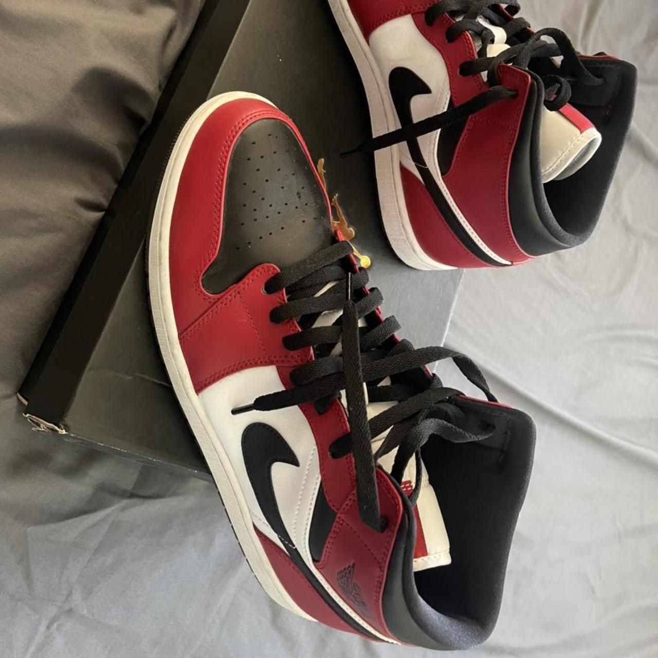 jordan mid 1 black toe