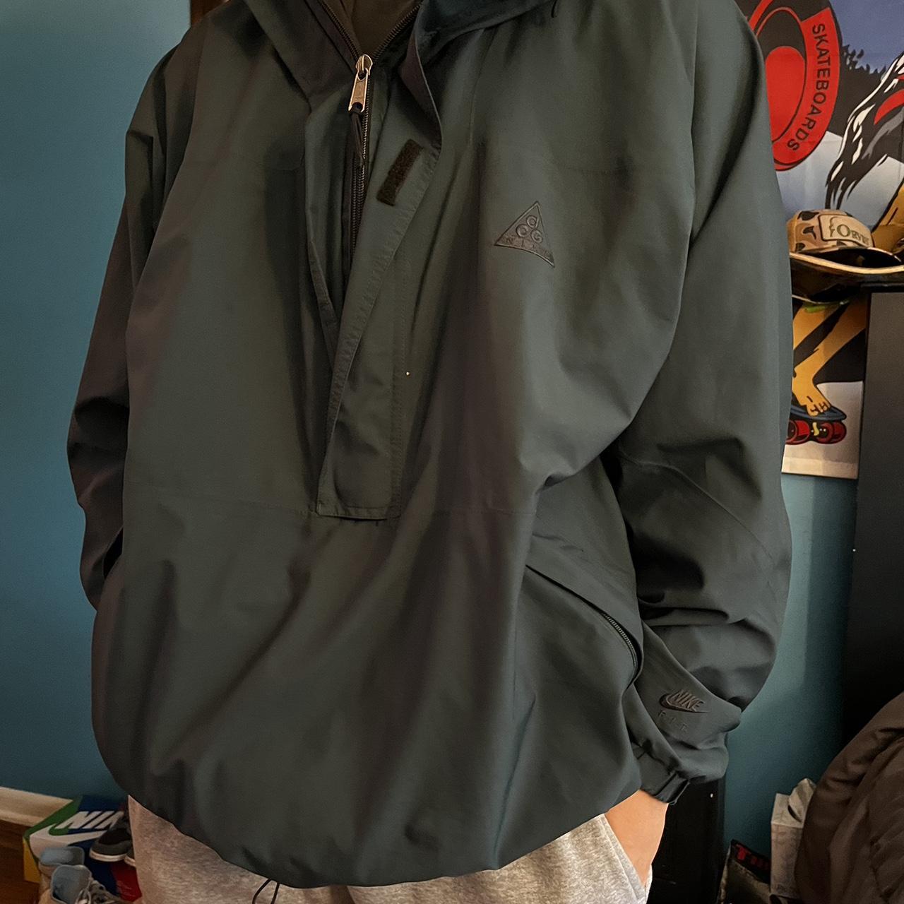 dark green nike windbreaker