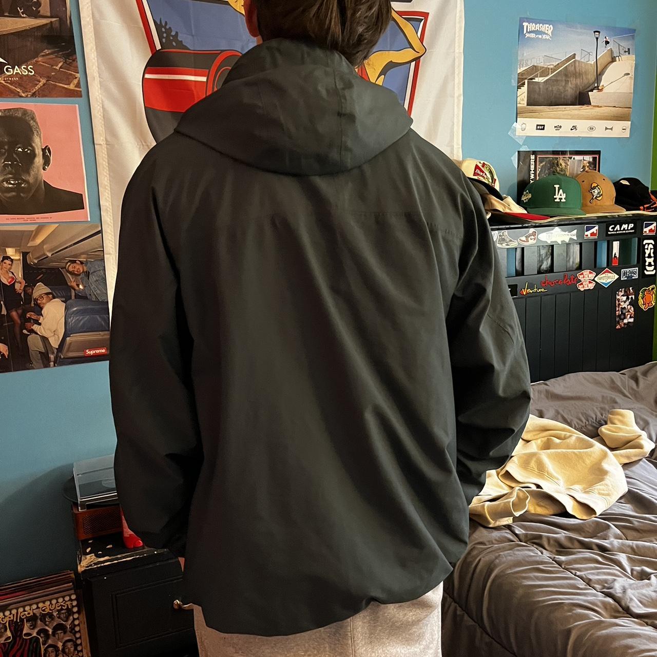 dark green nike windbreaker