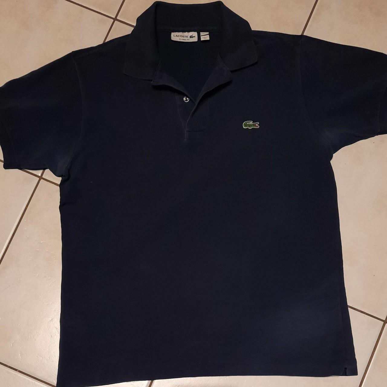 Lacoste navy polo. Classic fit. Size small. Used.... - Depop