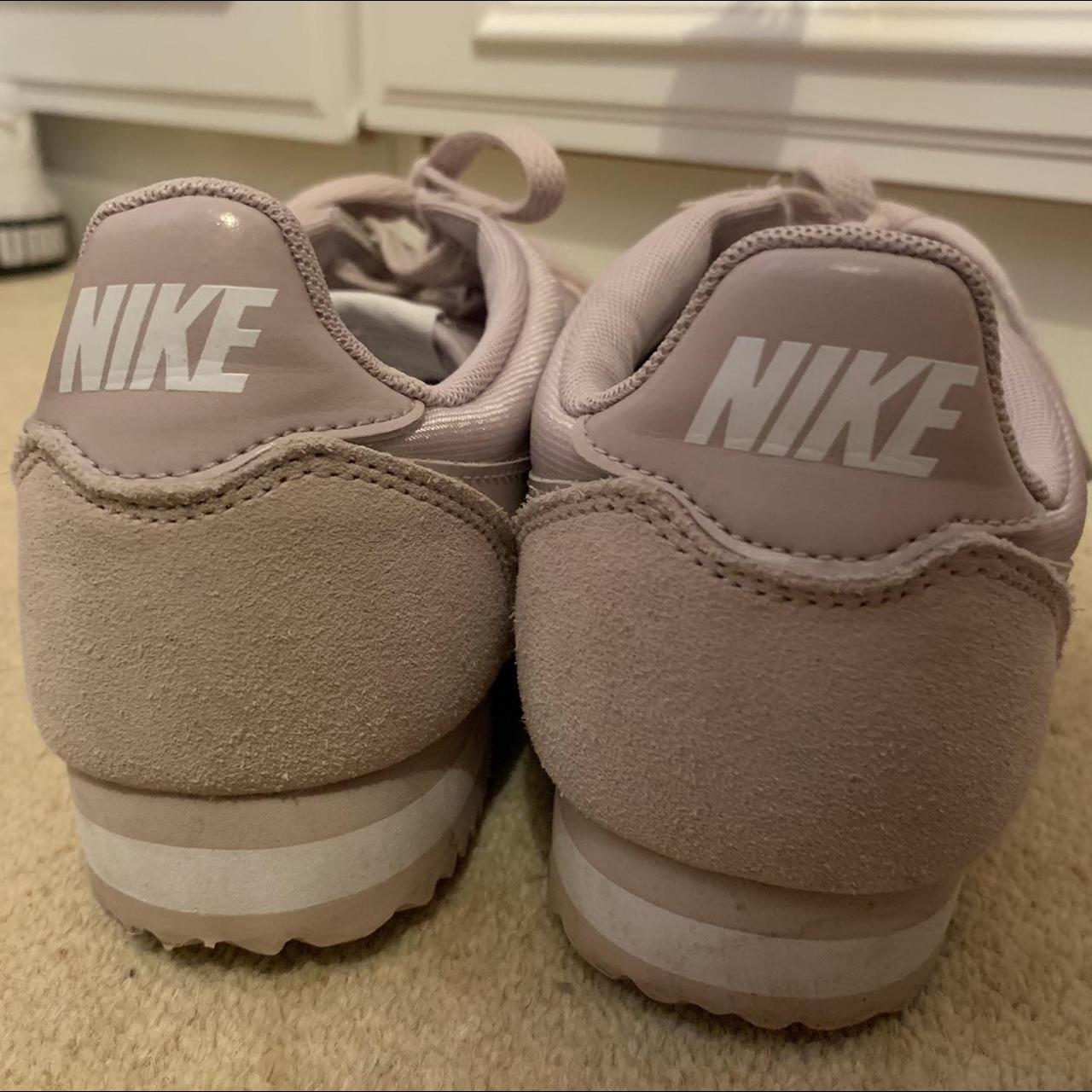 pink and yellow nike cortez