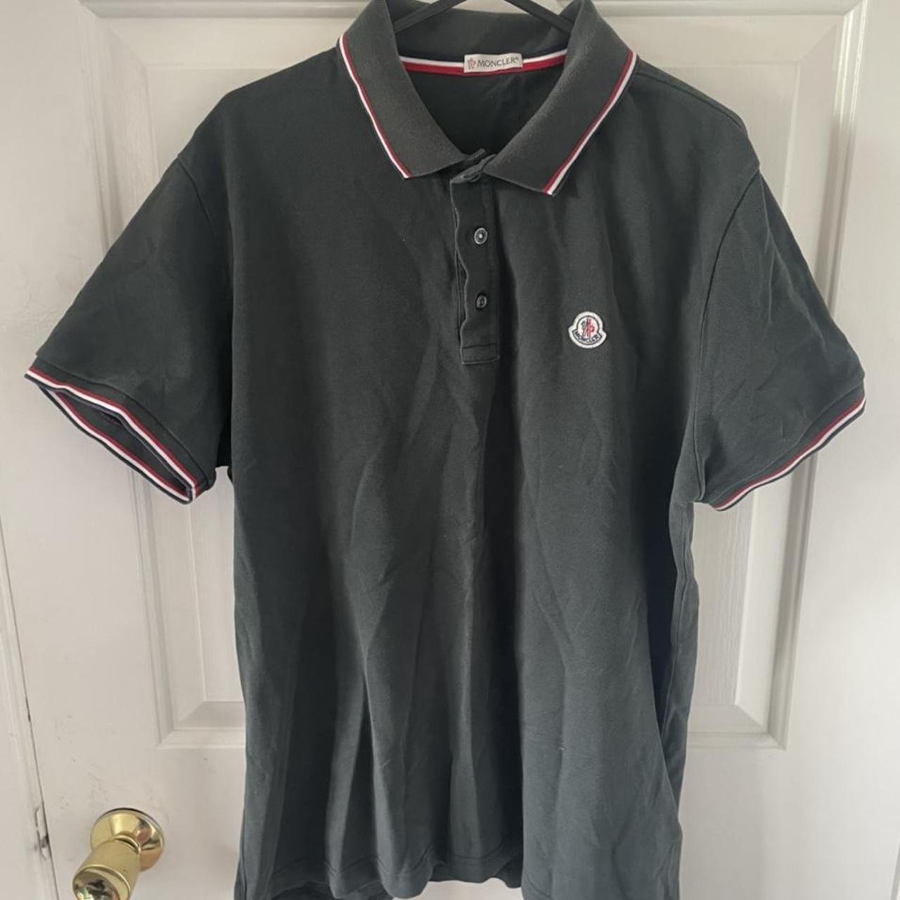 Moncler polo Colour is dark green/ black Used but... - Depop