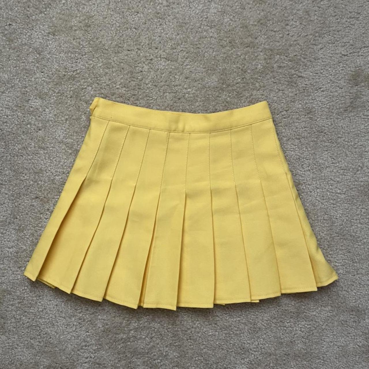 Ameri CHAPLIN MESSAGE LOGO PLEATS SKIRT | sensitivity.com.br