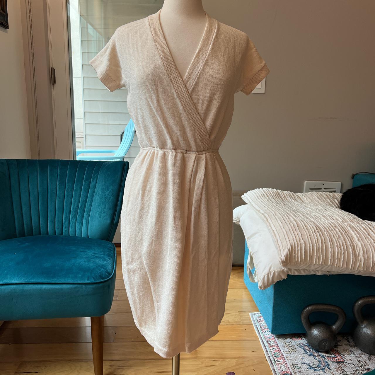 Vintage St. John knit dress. Size 6. Some holes on... Depop