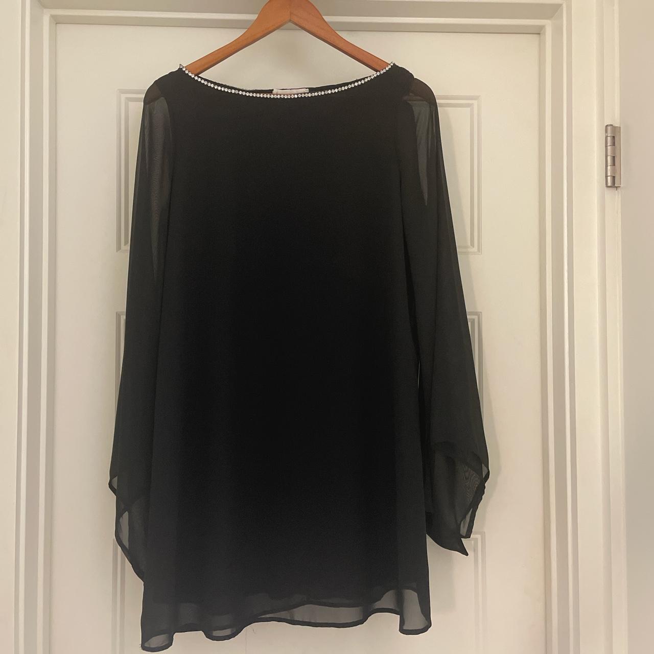 Elegant black dress with detailing around neckline - Depop