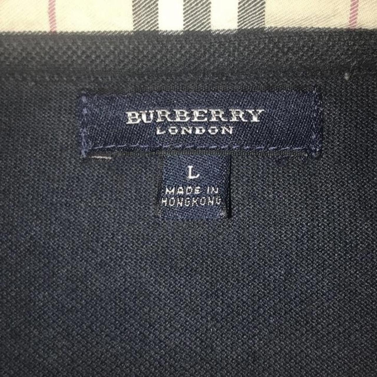 Vintage Burberry polo. Looks black in pictures but... - Depop