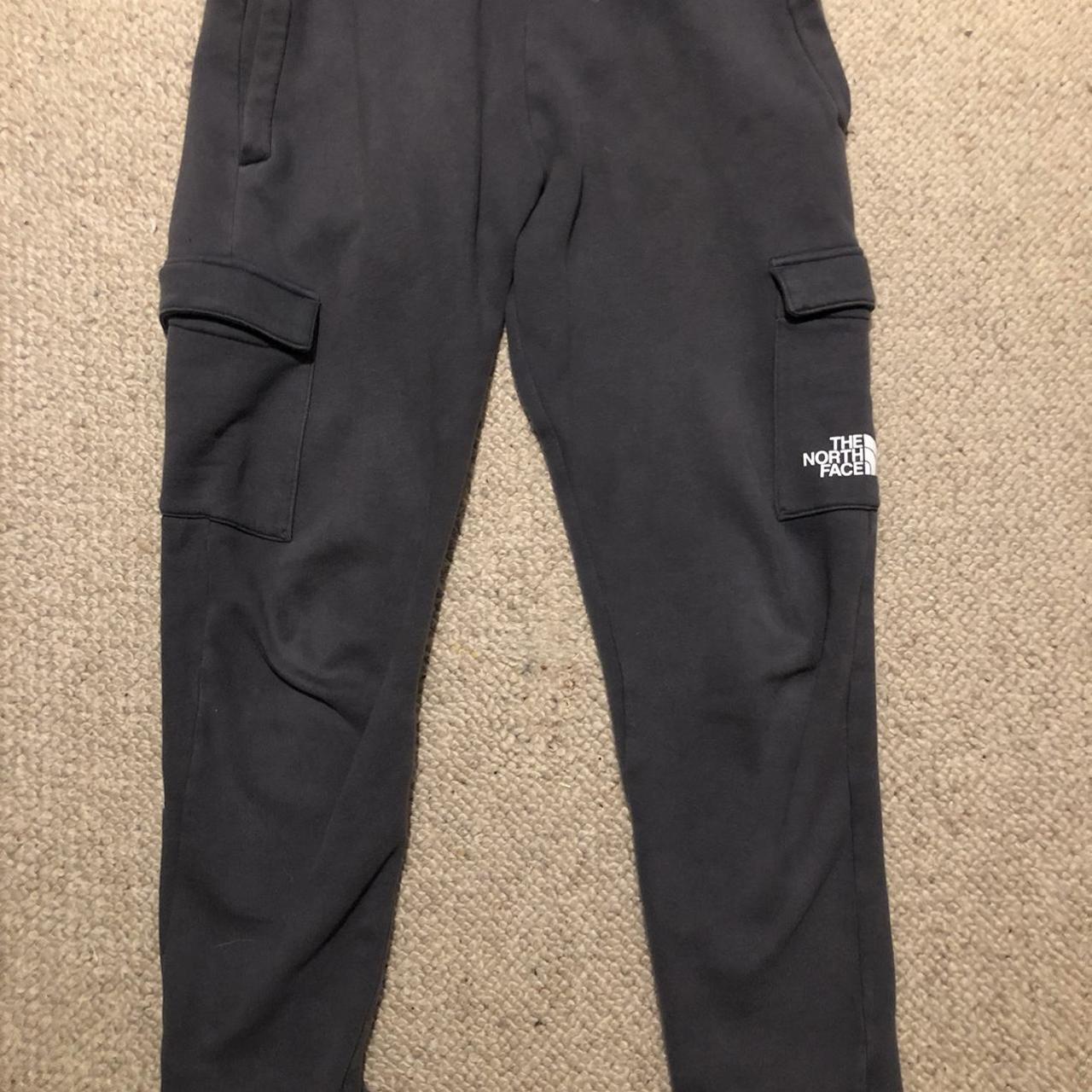 North face dark grey cargo joggers Size L junior... - Depop