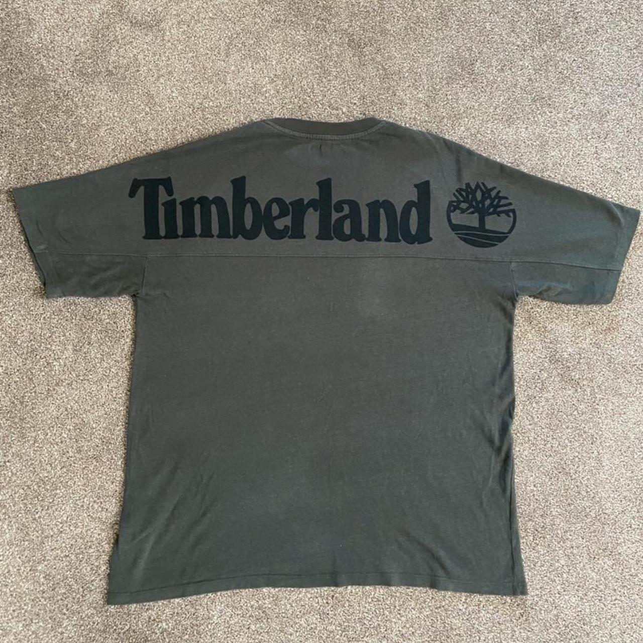 Dark green timberland T-shirt with logo on back.... - Depop