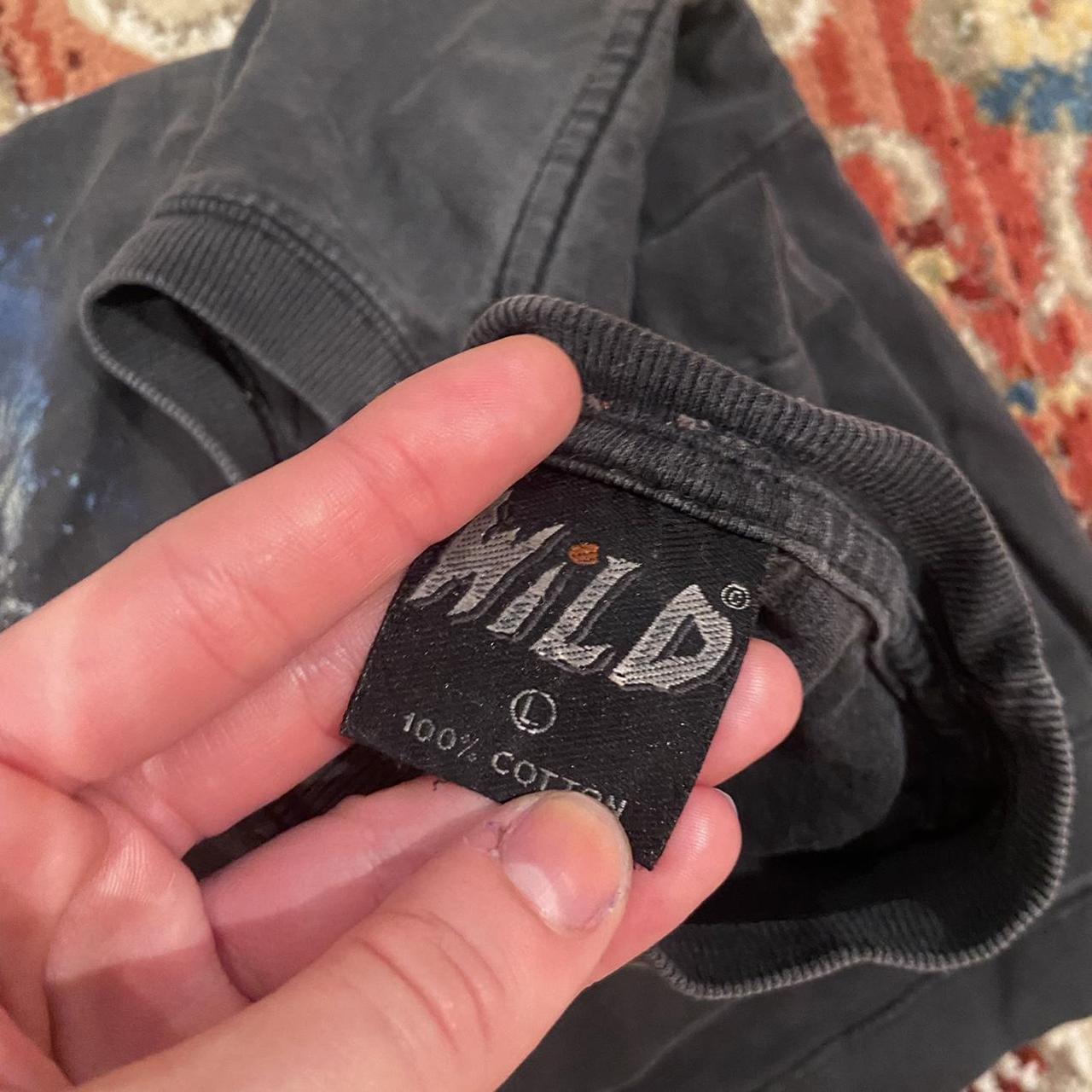 Washed out wild t shirt size large modelled on a... Depop