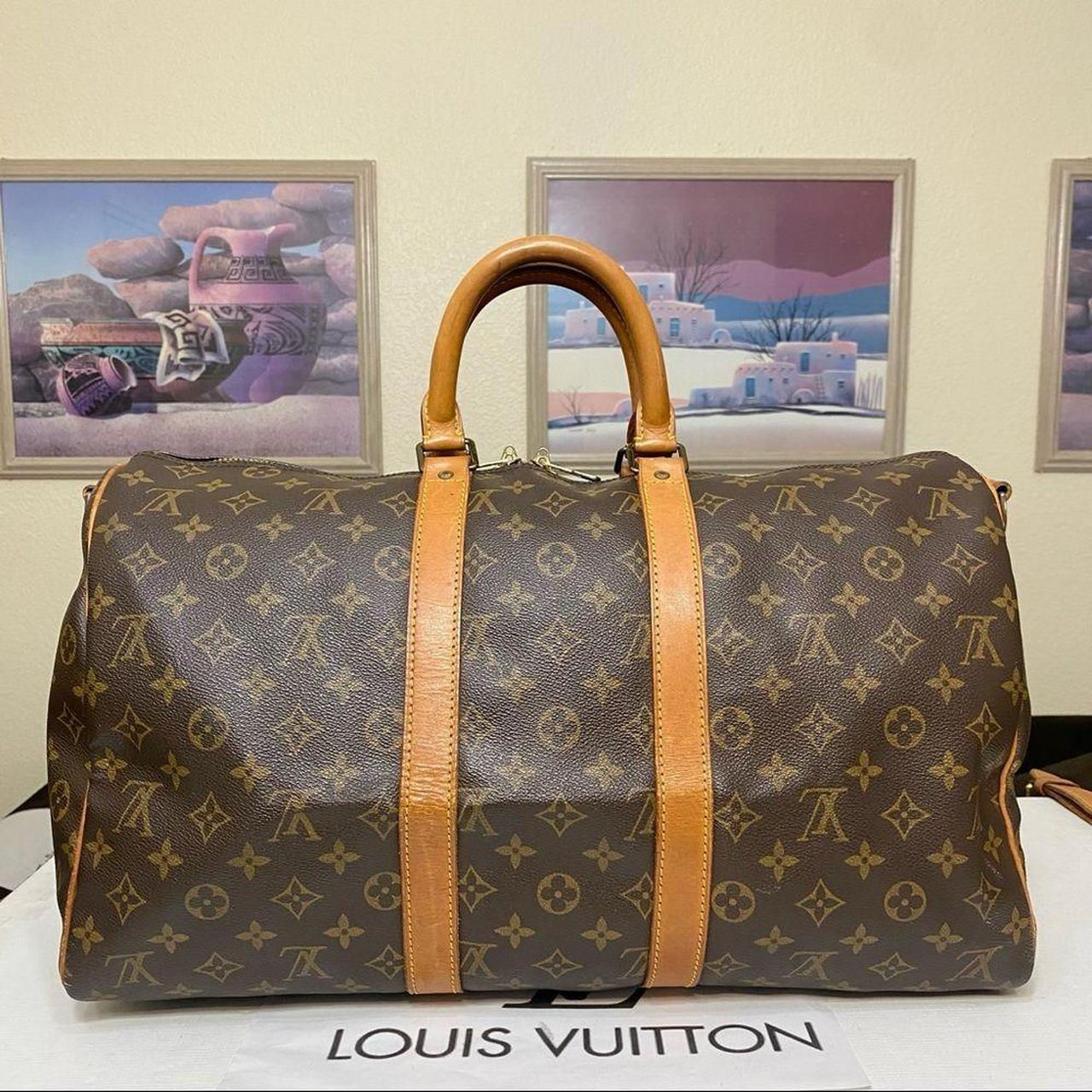 Authentic Louis Vuitton bag. Minor damage on corner - Depop