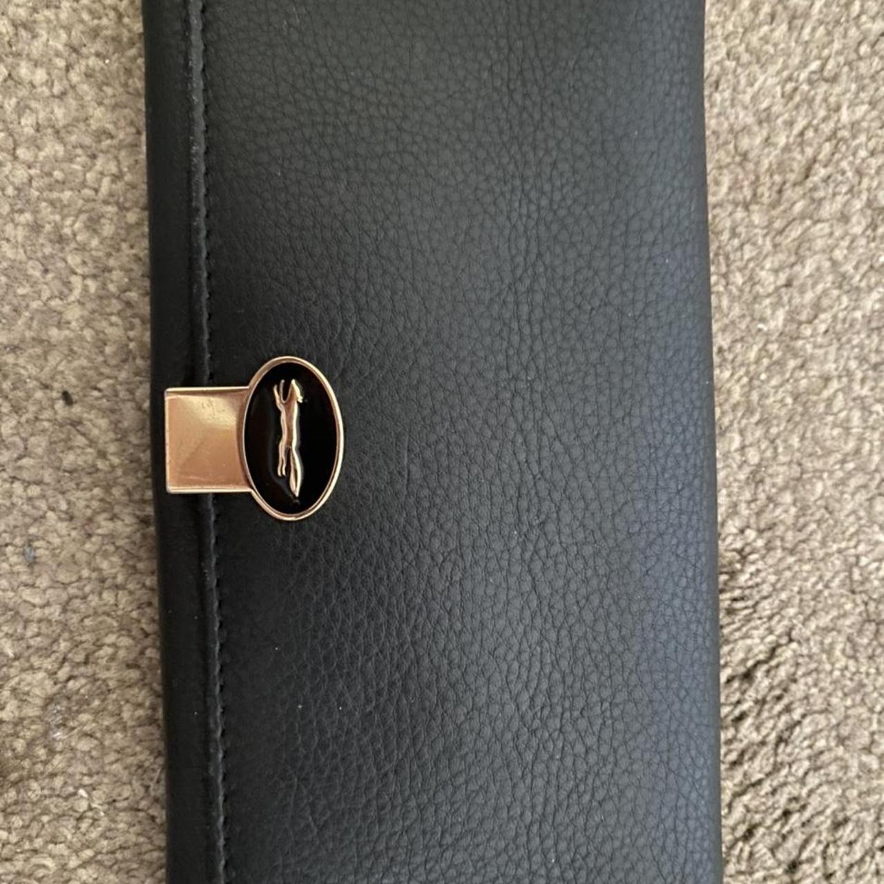 Black leather purse. Few marks on inside although... - Depop