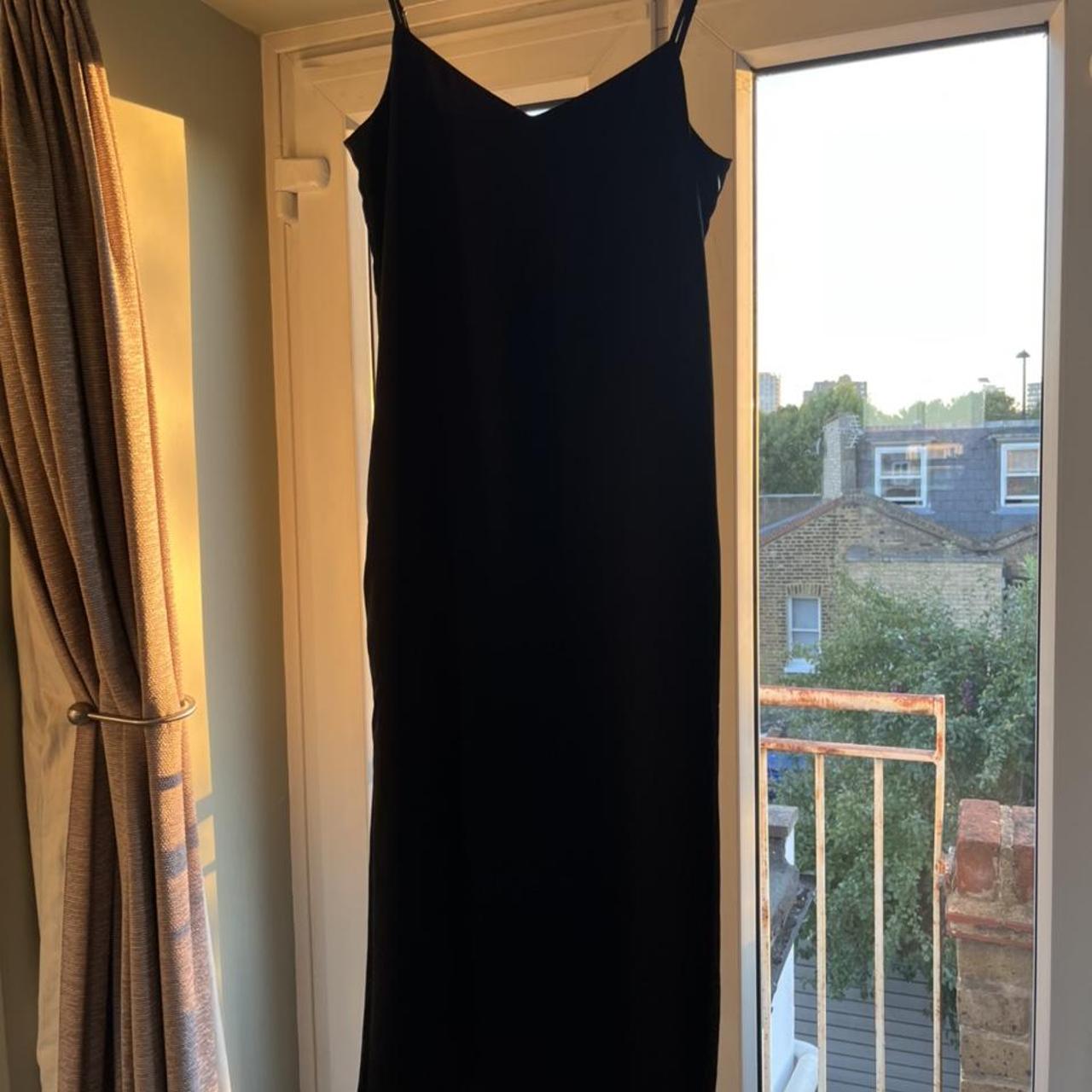 Black silk UNIQLO maxi slip dress with pockets.... Depop