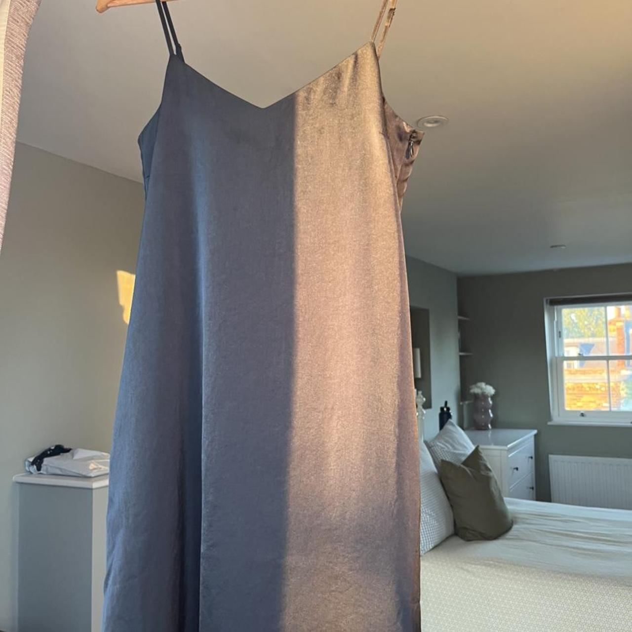 Black silk UNIQLO maxi slip dress with pockets.... Depop