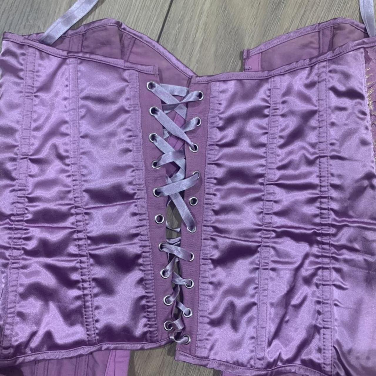 Purple corset with gold pattern. Such a cute corset... - Depop